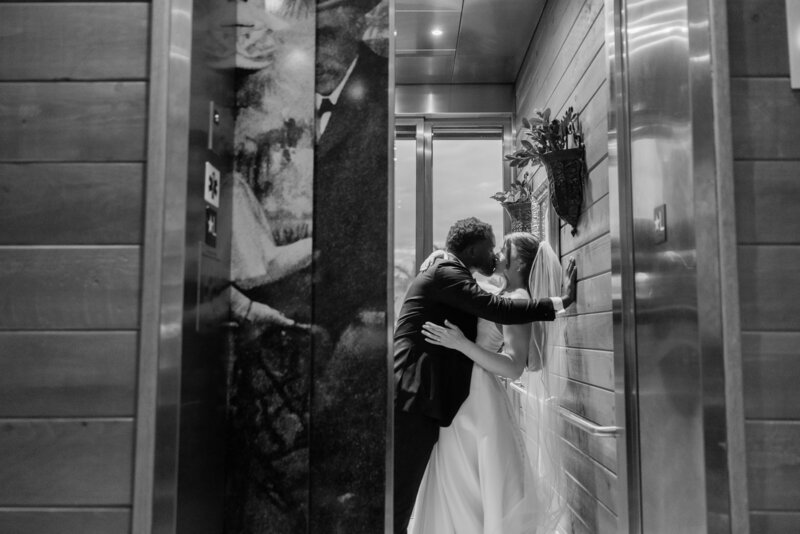 Bride and Groom in the elevator at the Ben, Autograph Collection in West Palm Beach in black and white. 
