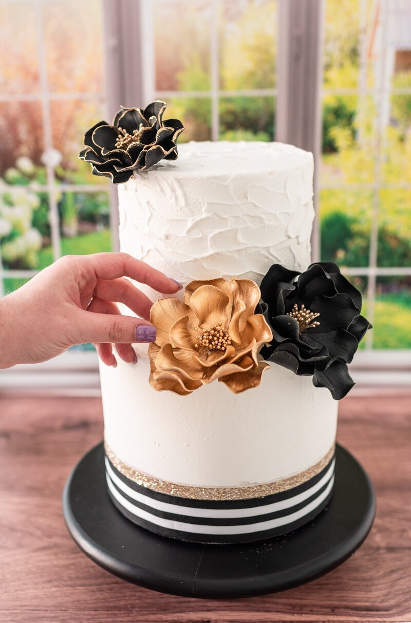 gold and black open rose sugar flower wedding cake by kelsie cakes