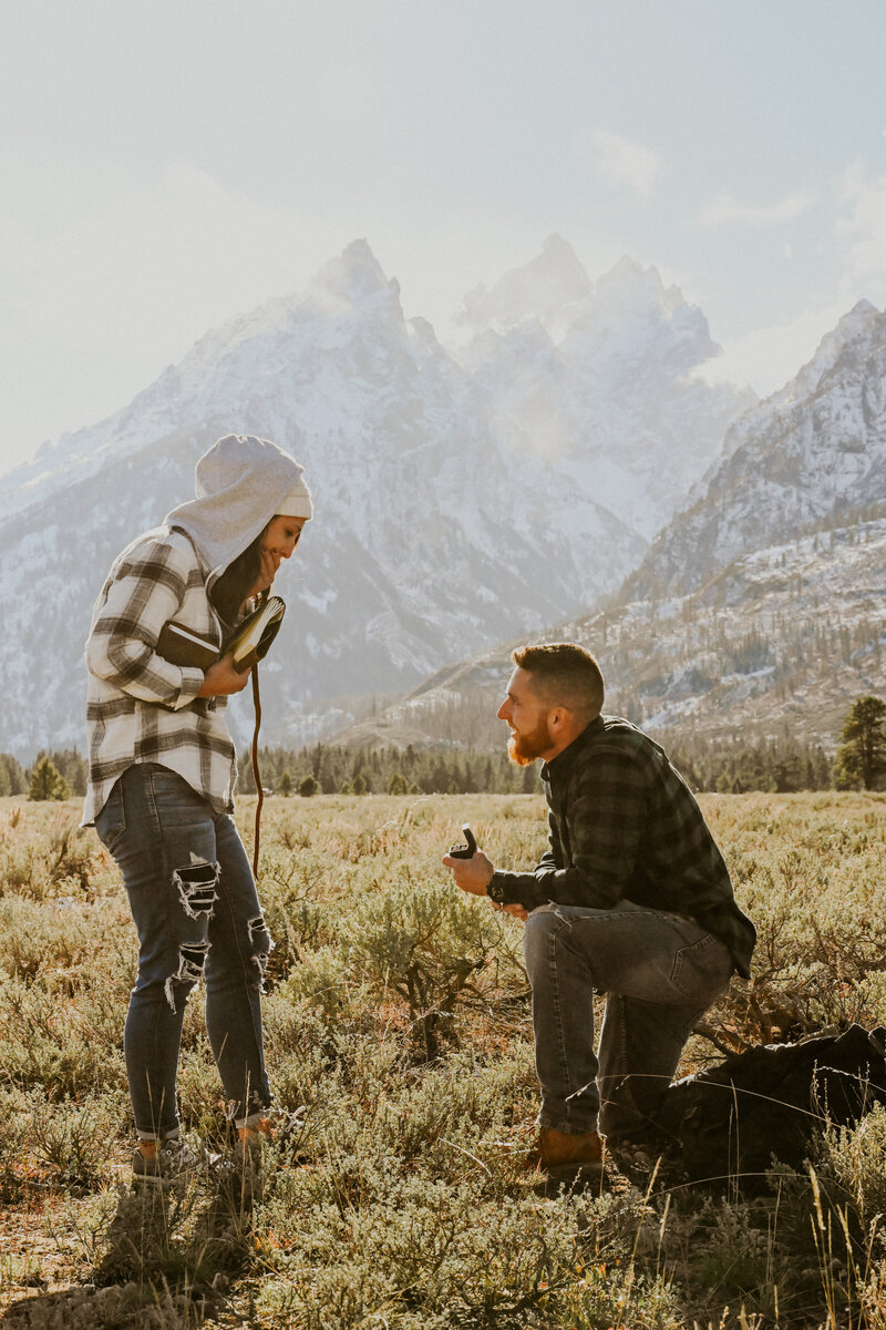 Boyfriend proposes to his long-time girlfriend while on a multi-week roadtrip at Grand Teton National Park in Jackson Wyoming