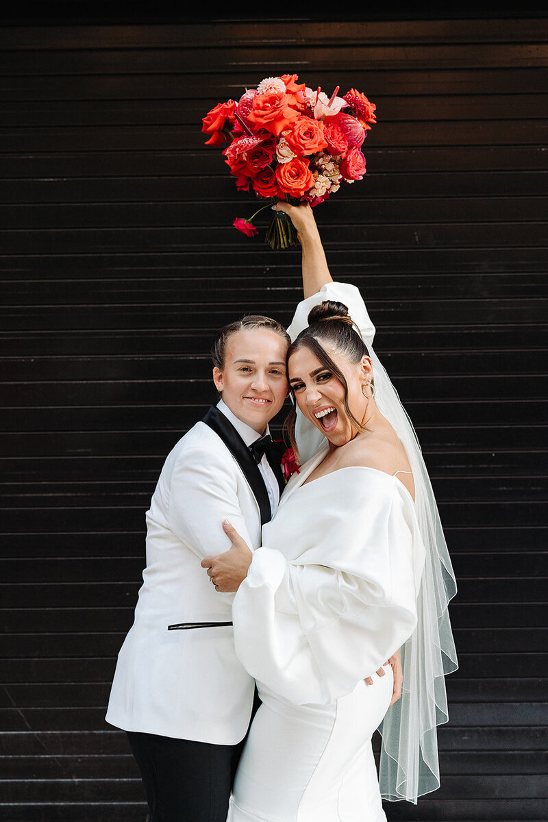 LGBTQ couple at Riley Building Austin wedding planned by Bianca Nichole and Co
