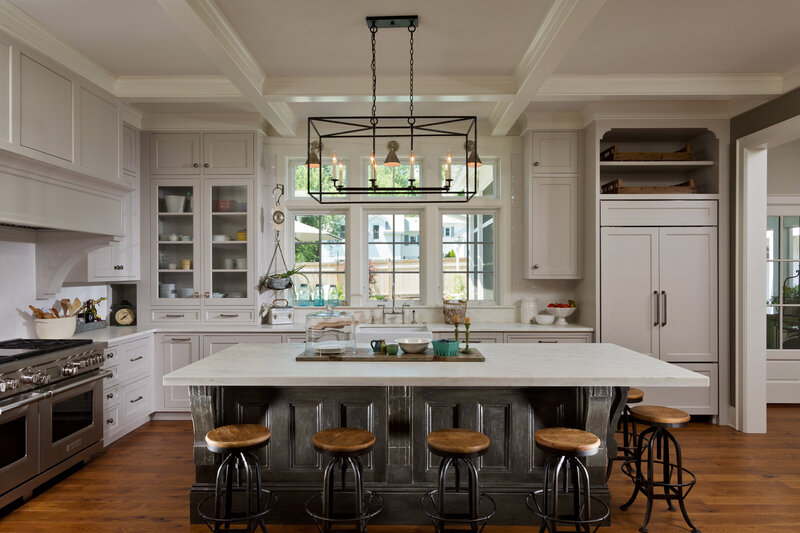 White kitchen with dark black wood accents