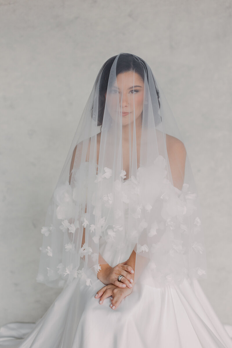 Side profile of bride in summer with floral crown and bouquet