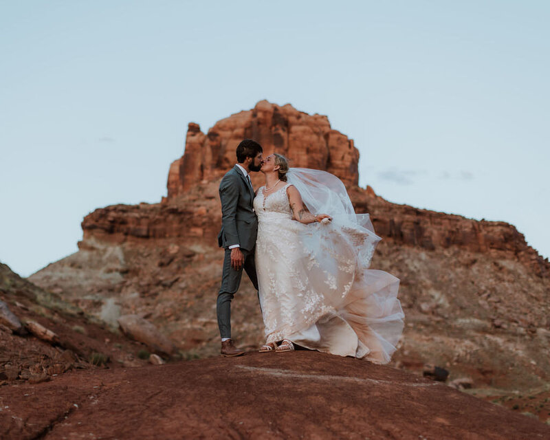 bride and groom kissing