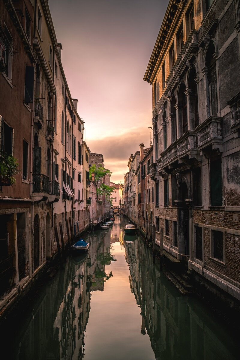 Sun setting over Venice city Street