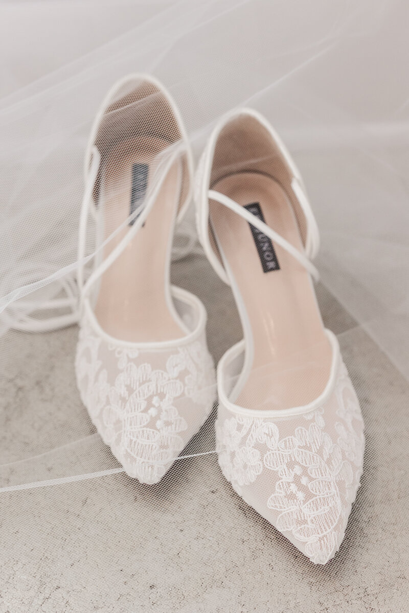 Lace wedding shoes and veil