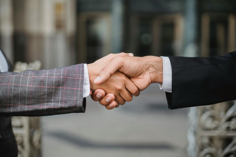 Man and woman shaking hands
