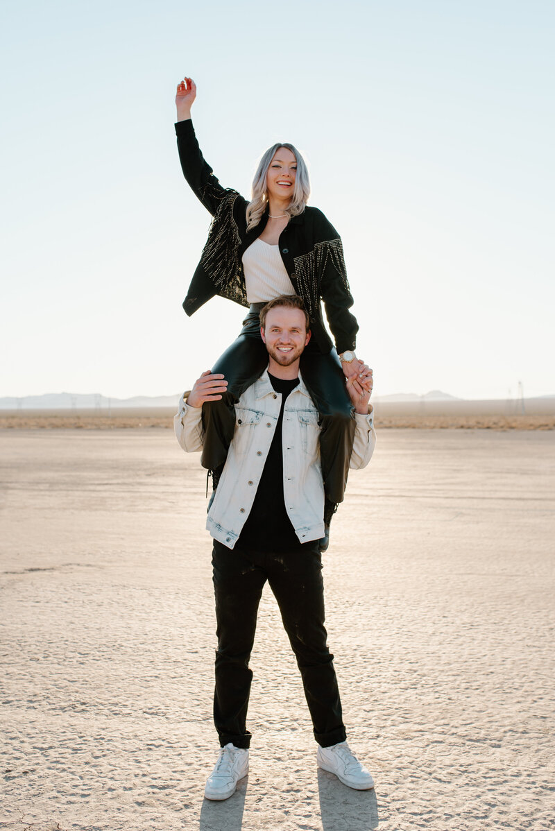 Modern destination engagement photos taken on a dry lake bed in Nevada