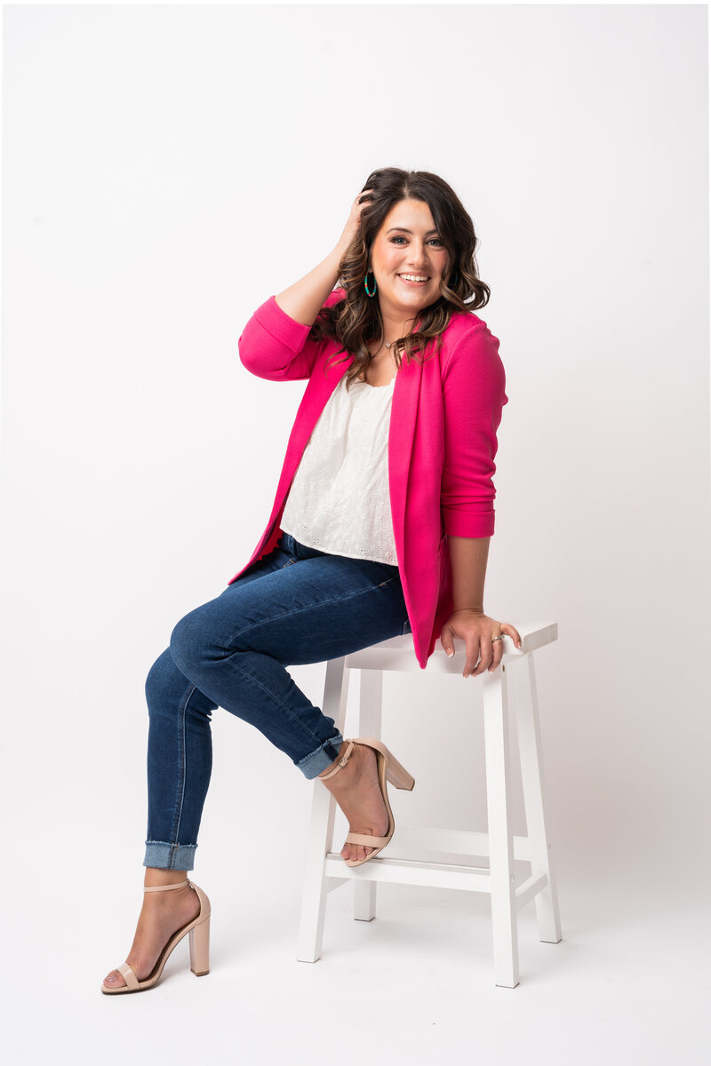 Professional studio headshot of Shayna Johnson, a Kentucky wedding photographer with a bright and joyful personality.