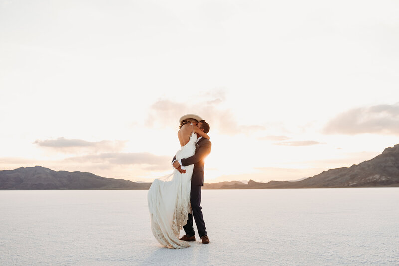 Gorgeous wedding photo of Colorado Couple  in the Salt Flats in Bonneville, Utah.  Sweet Justice are traveling photographers.