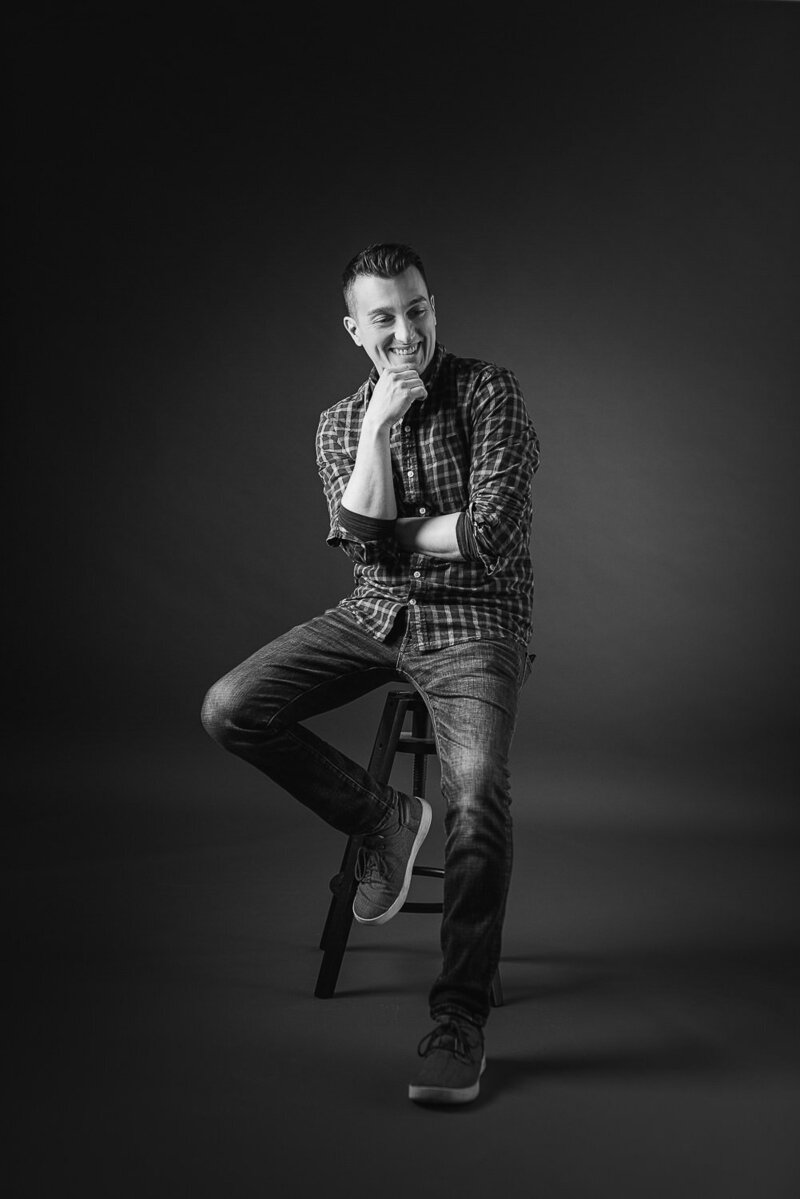 Skilled photographer capturing the essence of intimacy in every shot at Art of You Boudoir.