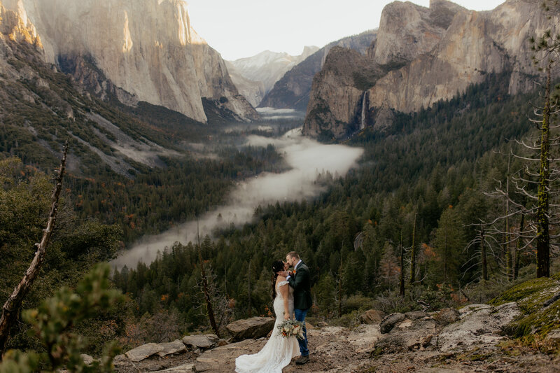 Bride and groom eloping at artist point in Yosemite