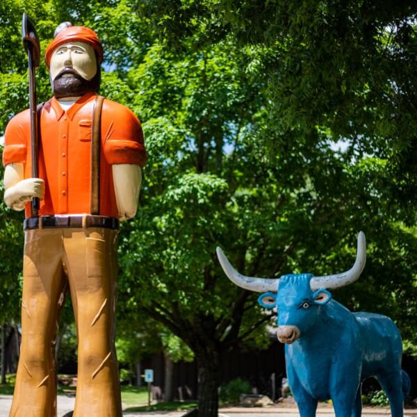 Statue of Paul Bunyan and his OX at the Paul Buynyan Logging Camp Museum in Eau Claire, WI