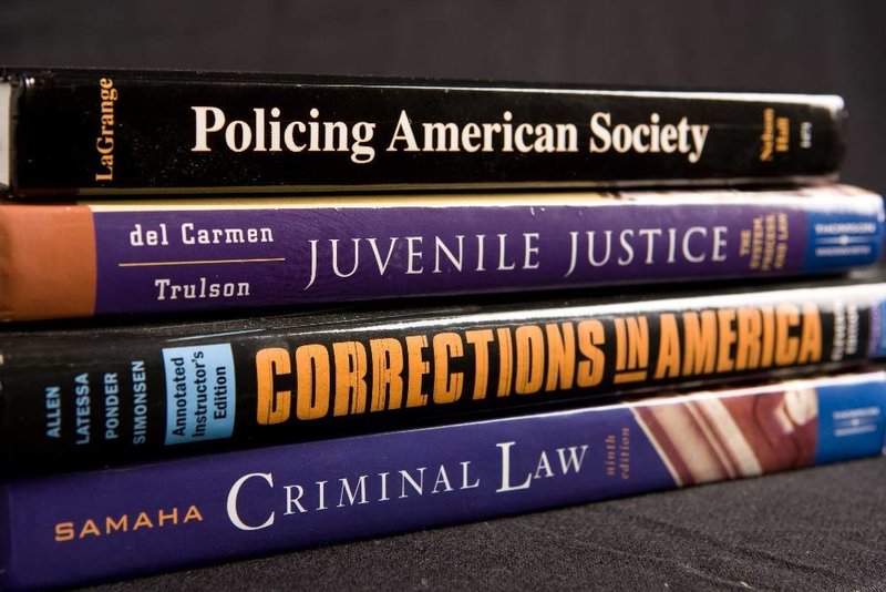 stack of criminal justice books
