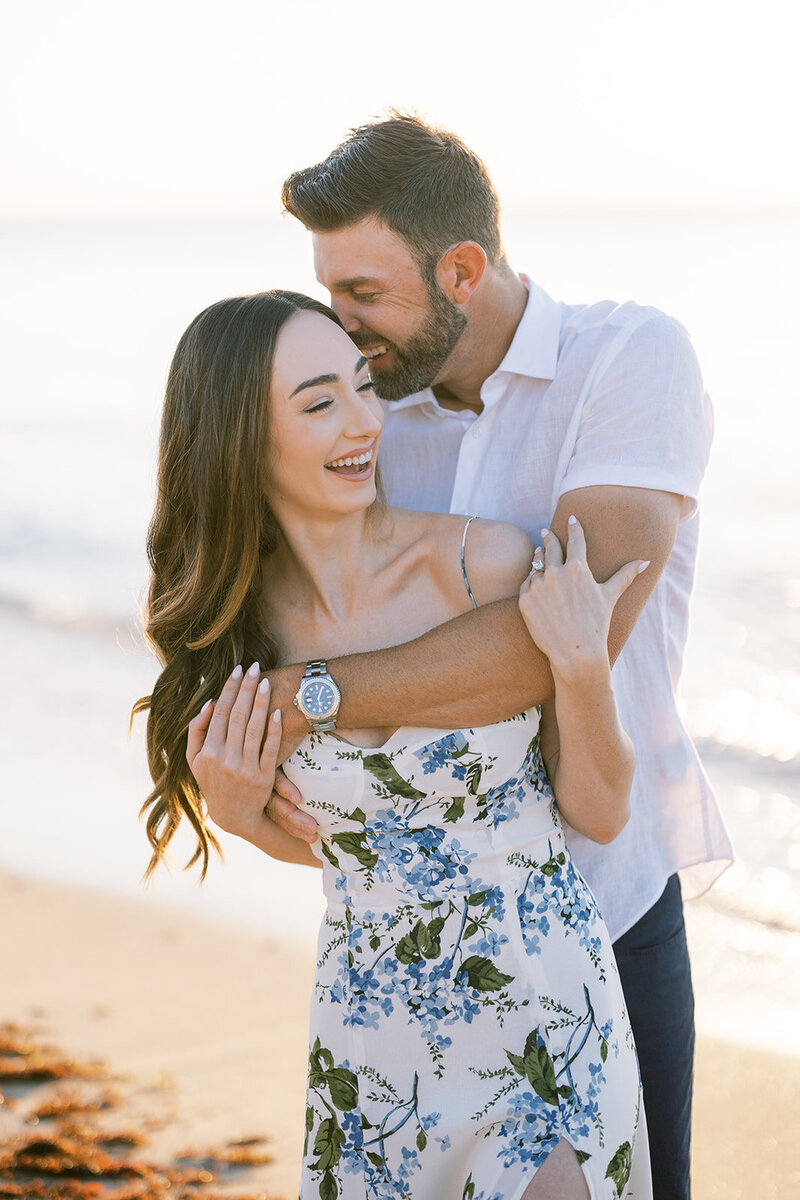 palm beach sunrise lighting with a beautiful couple for their engagement session on Worth avenue palm beach