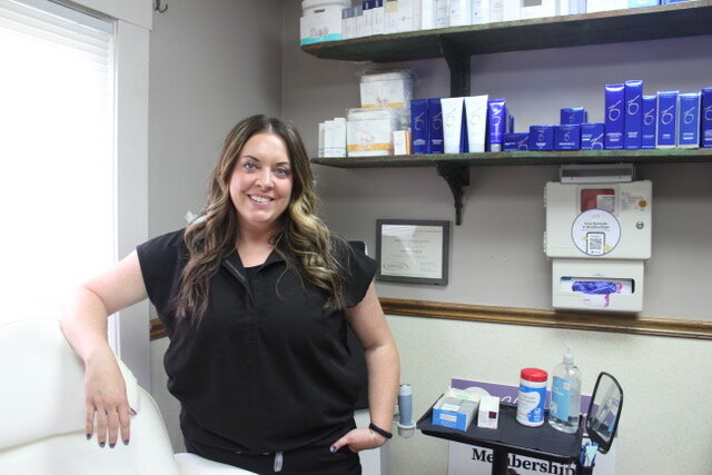 Jen smiling in the vIVID Life Spa building