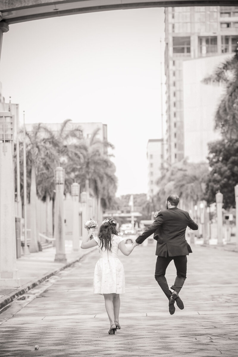 florida-bride-groom-skipping-down-street