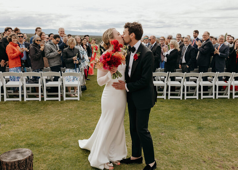 Vibrant modern wedding flowers in shades of pink, red, and orange