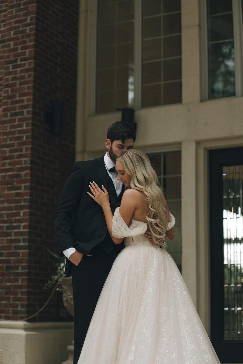 Bride and groom at The Ritz-Carlton Beach Club in Sarasota, Florida—capturing romance and coastal elegance at a luxury beachfront wedding venue, planned by Watters & Co. Events