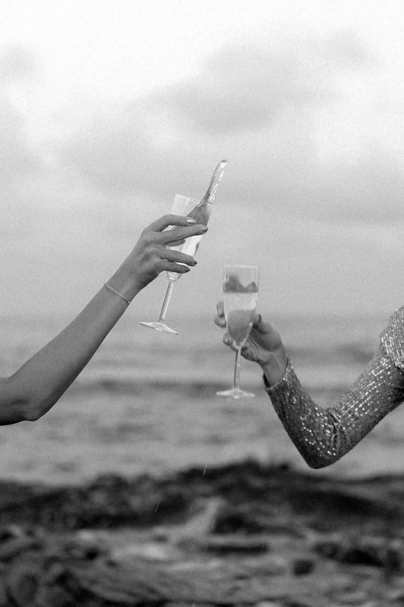 Natalie Bernacchi holding a clear crystal point during a Reiki session, promoting energy healing and chakra balancing.