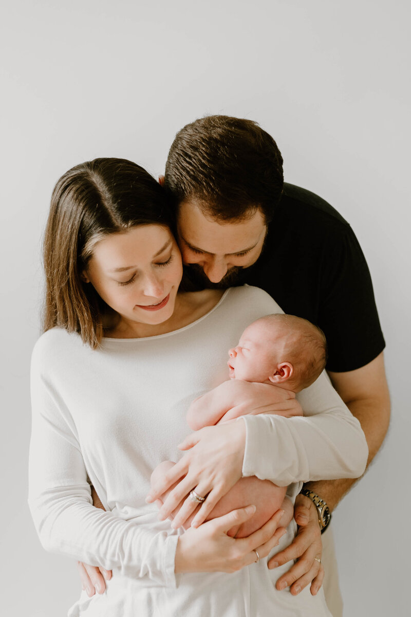Lifestyle photos with newborn baby done by Sydnie Decou Photography