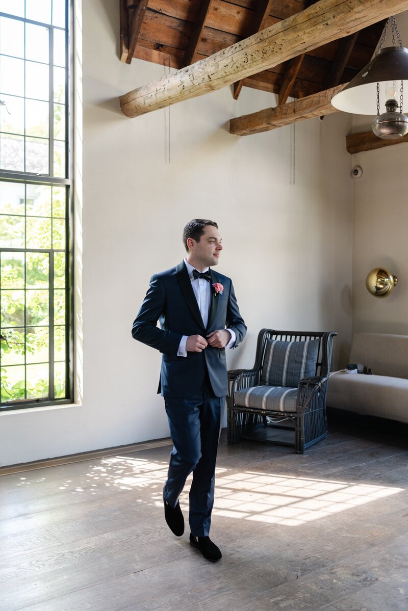 Hotel Chelsea wedding couple hugging in the ceremony space