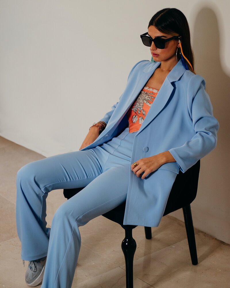 Business Woman in Blue Suit Consulting