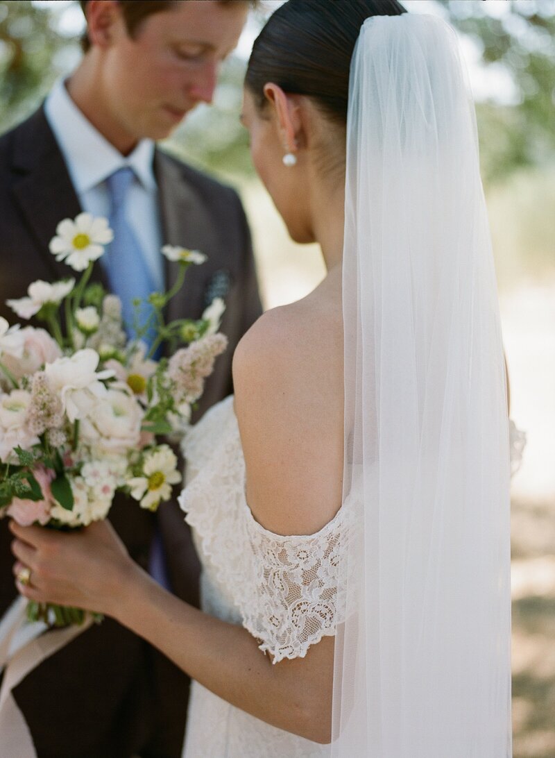 Loop flowers luxury wedding tablescape with yellow and pink florals with accents of burnt orange and slate blue