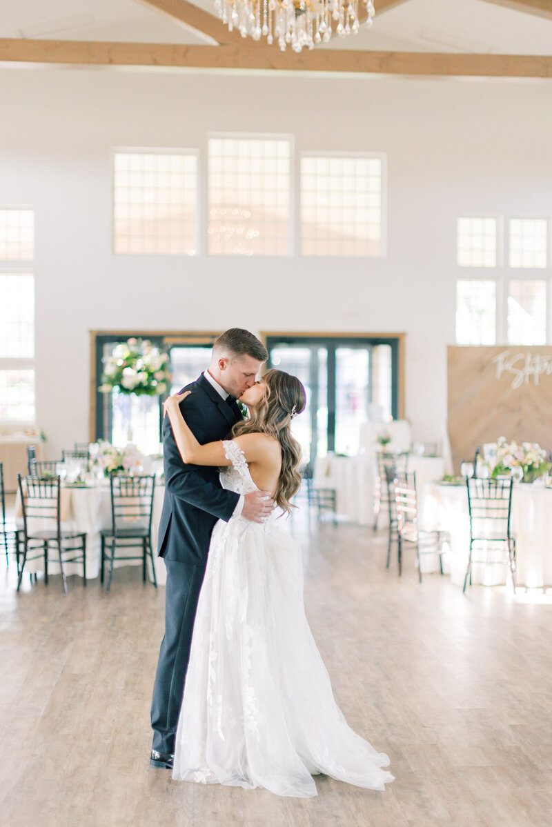 Couple practicing their first dance on wedding day at Rosewood Farms