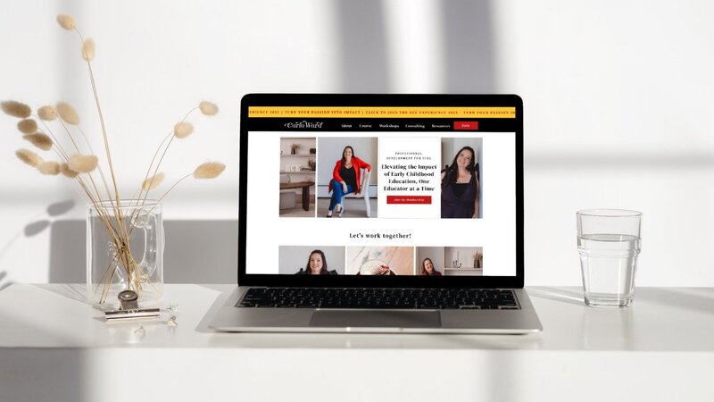 Laptop on a white desk displaying Carla Ward’s professional website with sections highlighting her ECE consulting and workshops.