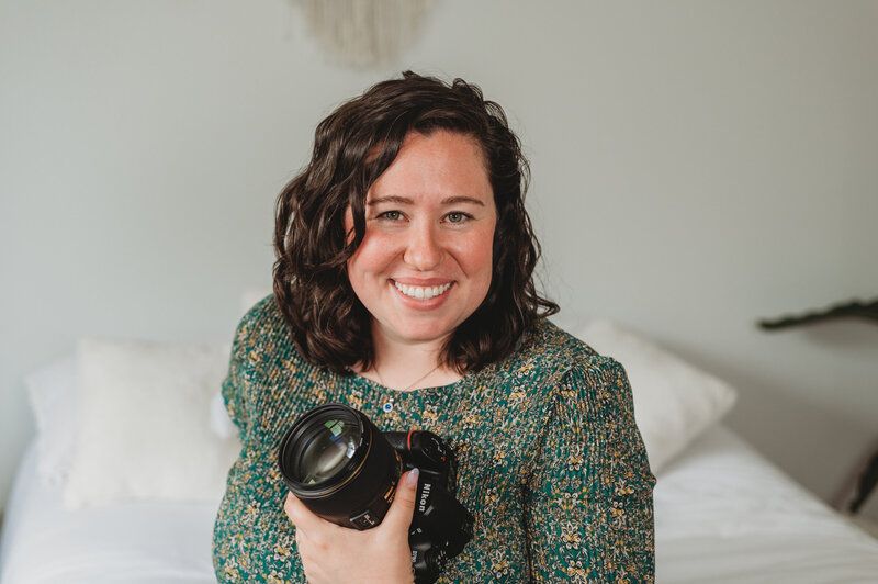 Connecticut Wedding Photographer holding a camera