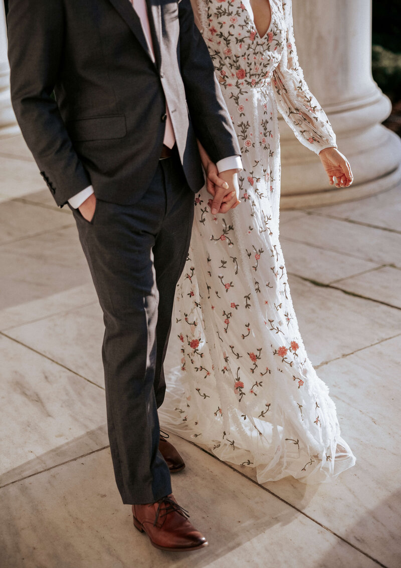 sophisticated-couple-walking-hand-in-hand