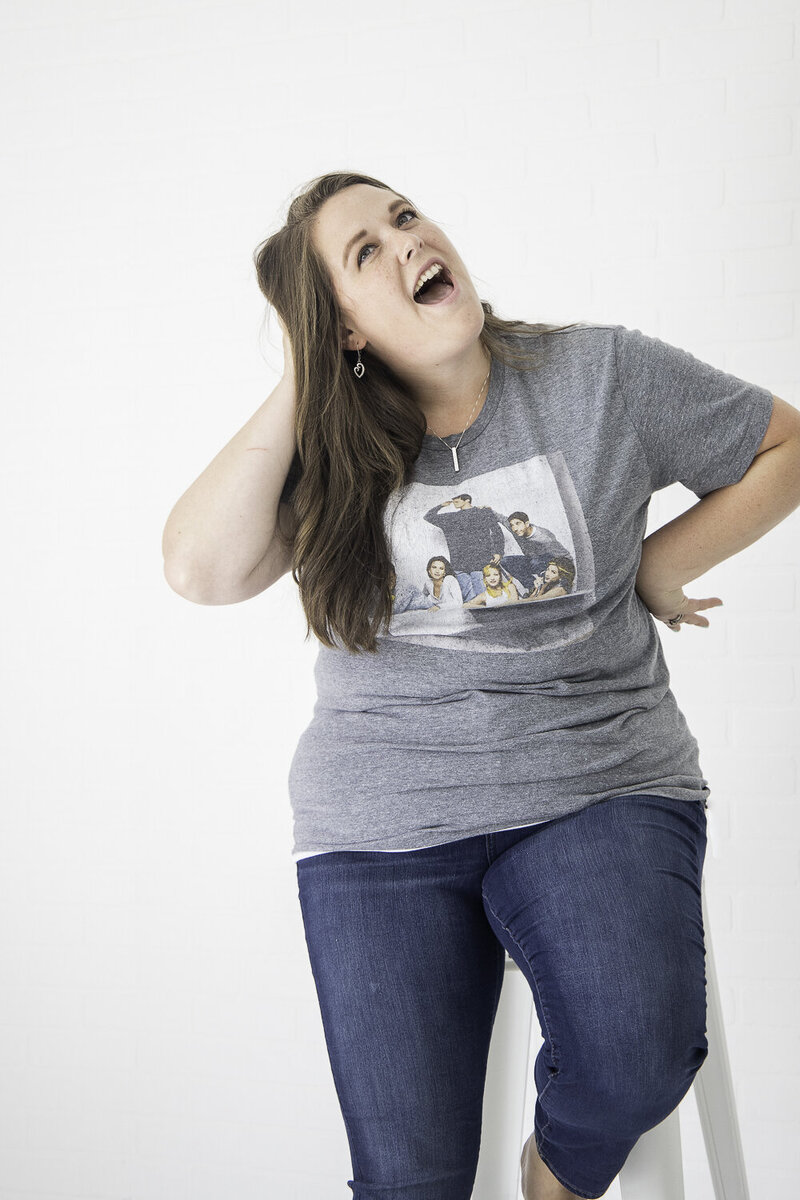 Mckinney newborn photographer laughing about a Friends episode.