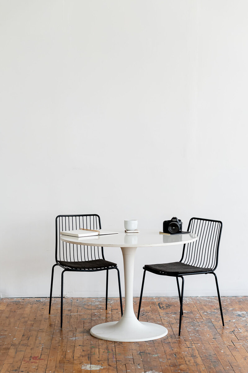 glasses rest on a small business owner's desk