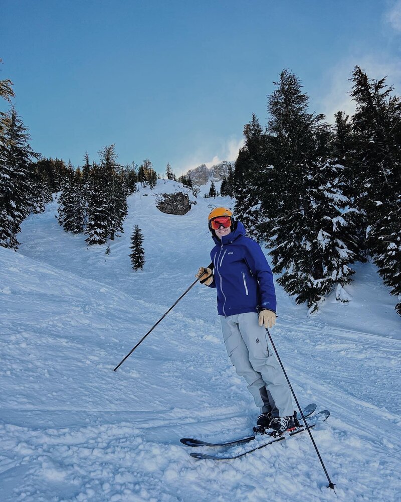 Brad skiing down a mountain