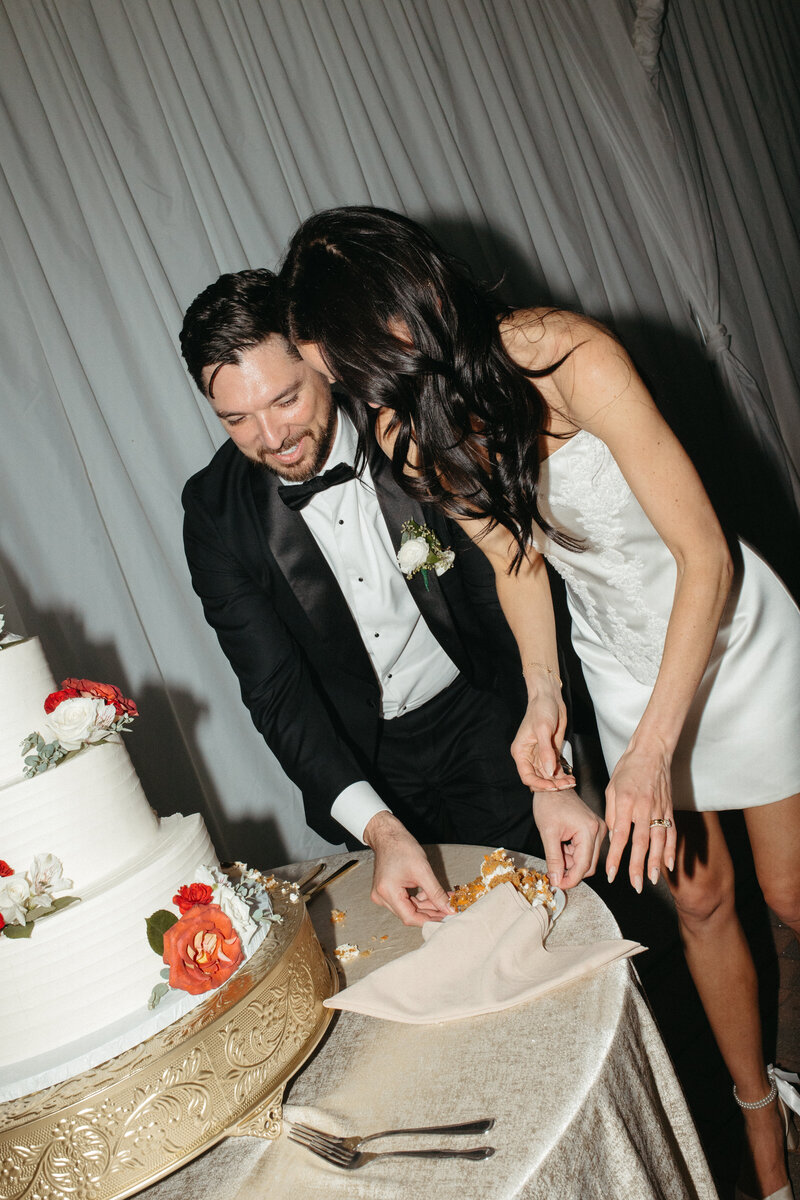Fun wedding cake cutting at Chardonnay Golf Course in American River, California.