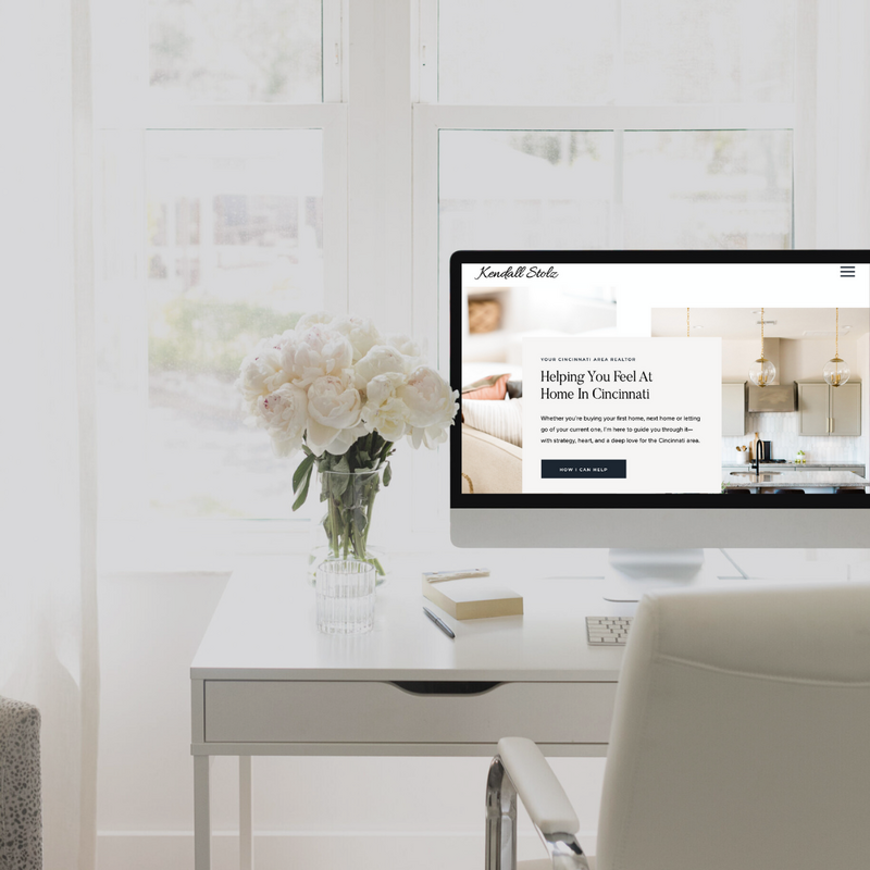 Kendall Stolz, Cincinnati Realtor, website on computer