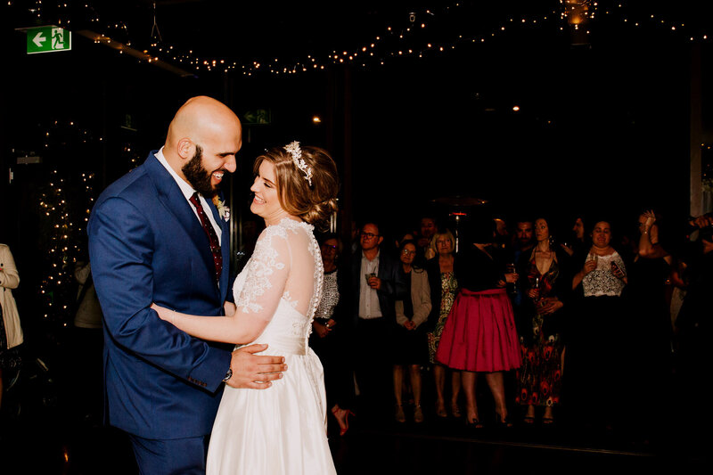 Bride and Groom first dance lovingly looking at each other