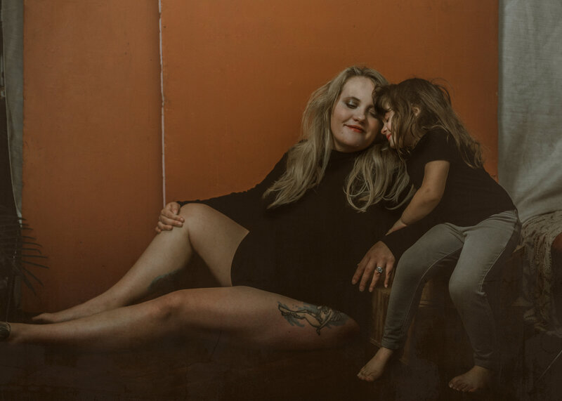 Luxury Photographer, and one of the Midwest's best in boudoir, weddings, portraits and family