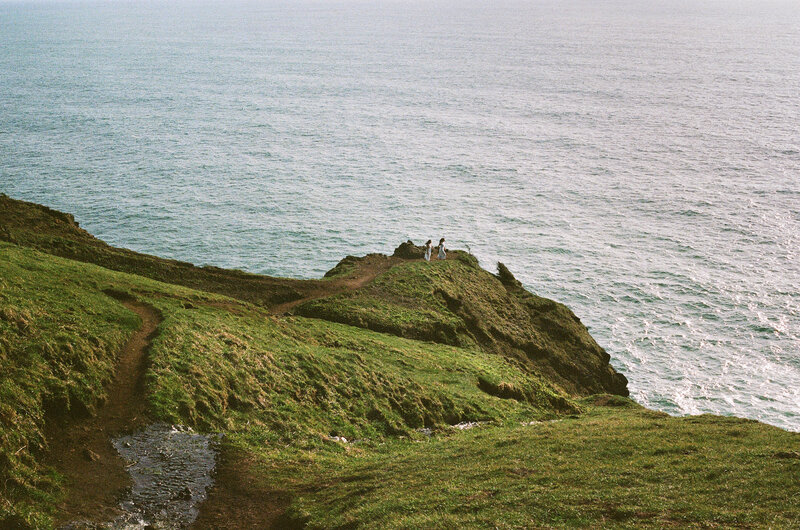 couple walking to clif