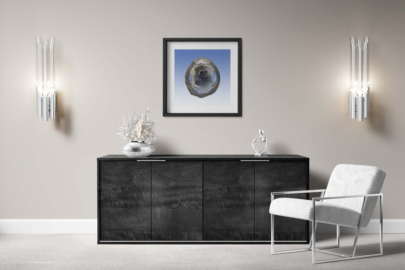Fine art photo print with a black wooden frame featuring Project Stardust micrometeorite NMM 628