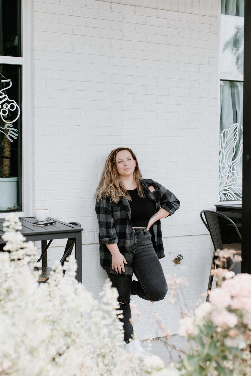 woman standing against wall