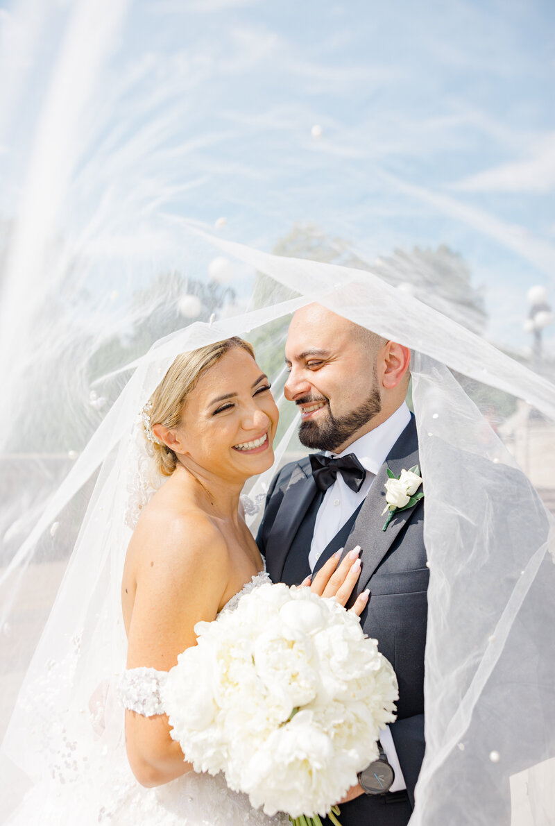 Grey Loft Studio - Bethany and Luc Barette - Wedding Photography Wedding Videography Ottawa - Wedding at St Elias Couple Smiling Holding Hands