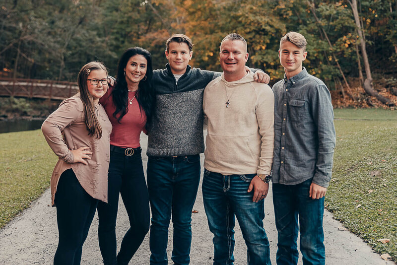 family at acadia reservation for photography session all standing together smiling