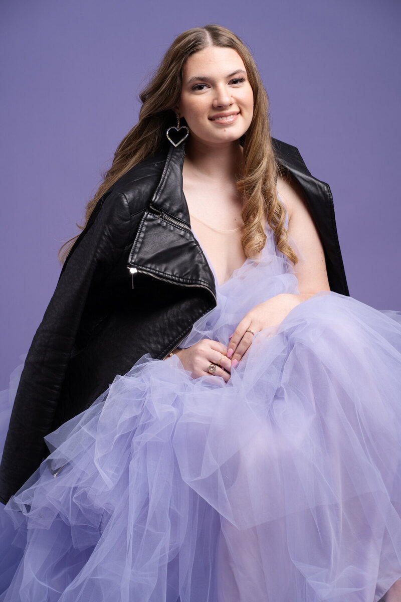 Choose from outdoor and studio settings for a memorable portrait experience.