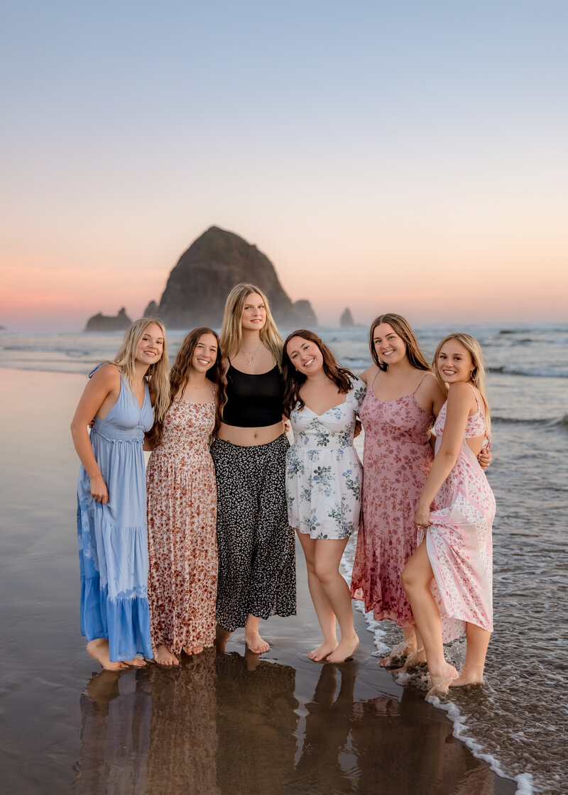 Girl dancing in field at Milo Mciver Park for Senior Portrait session