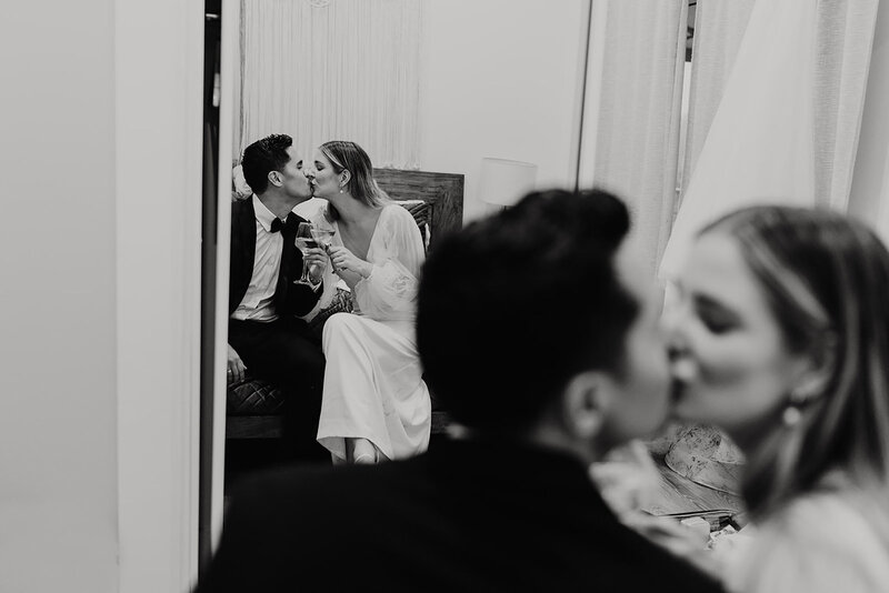 G&J-bride and groom kissing in their bedroom