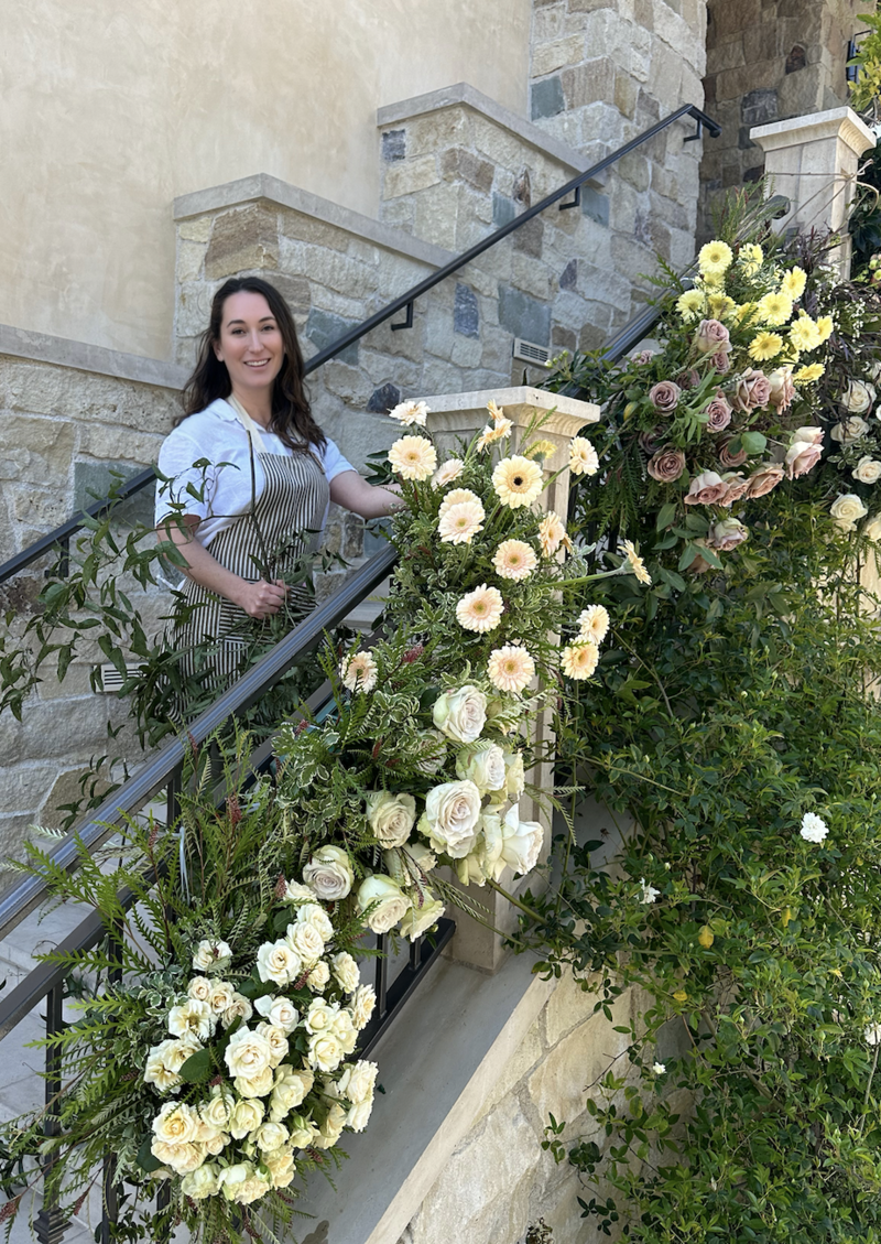 San Diego wedding florist Sarah creating staircase installation