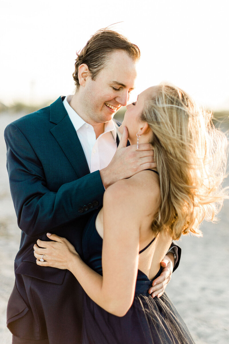 Wind and Sun Engagement Photos | Wrightsville Beach NC | The Axtells Photo and Film