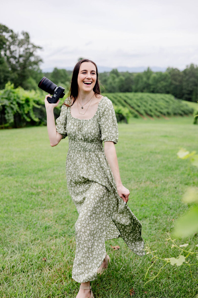 atlanta wedding photographer keri lindekugel posing with camera