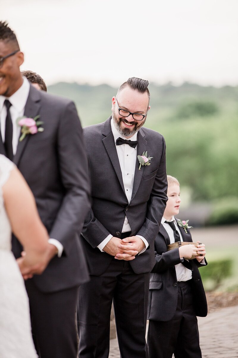 groomsman laughing by Knoxville Wedding Photographer, Amanda May Photos
